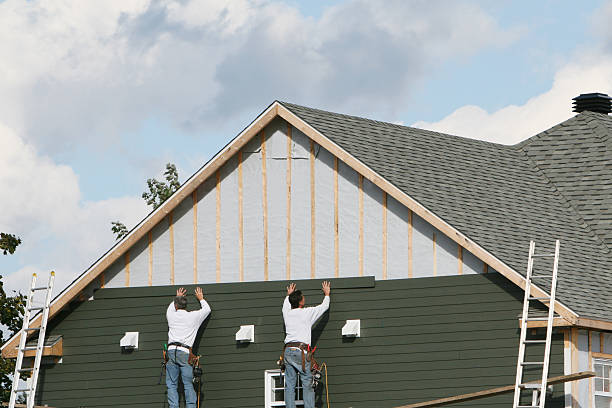 Professional Siding Contractor technician working in Plainview, NY